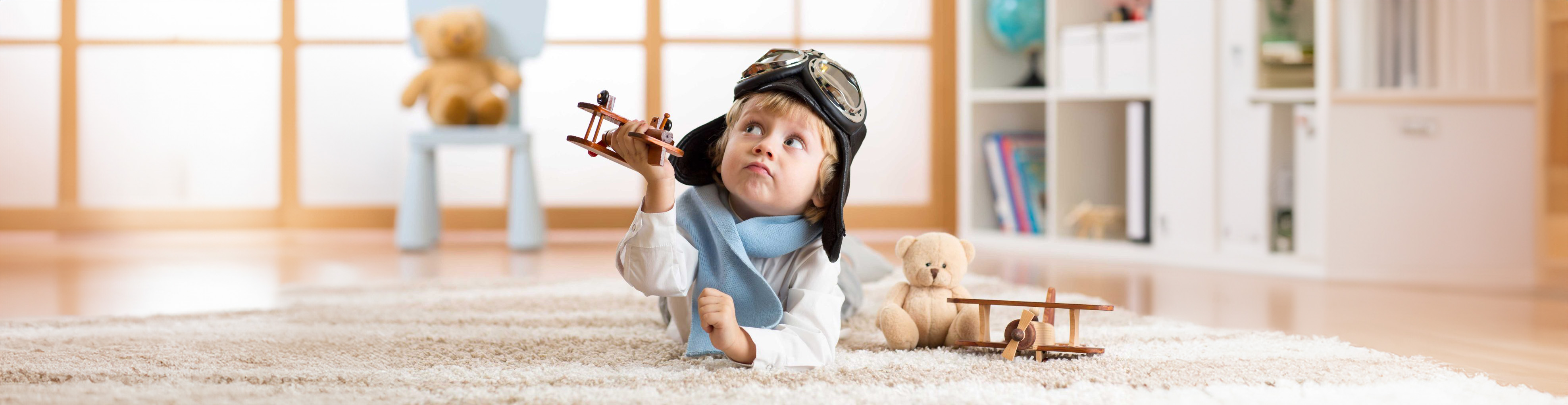 children playing with toys in his room
